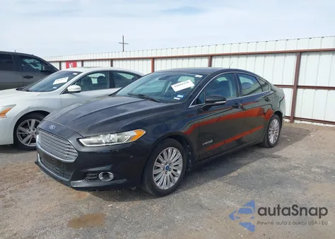 2013 Ford Fusion Hybrid Se z USA, uszkodzony, nr VIN 3FA6P0LU5DR188451